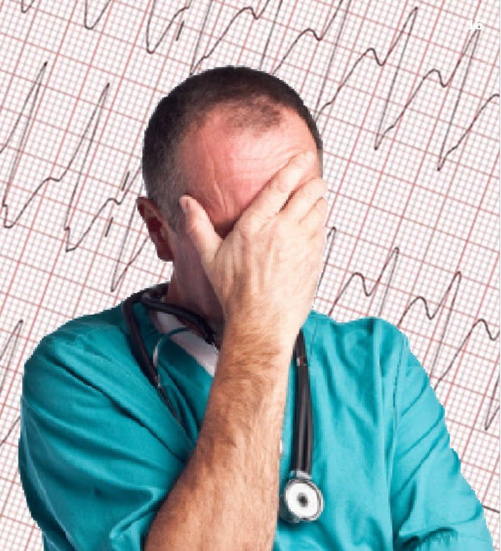 Stressed doctor in front of an ECG